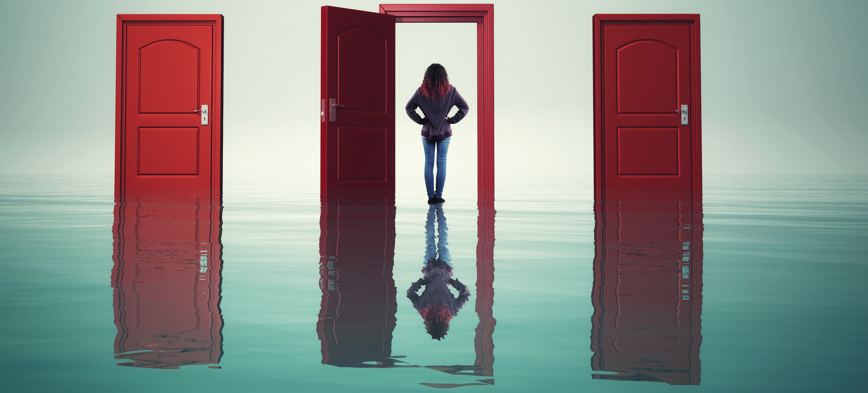 A woman deciding which door to select for the future.